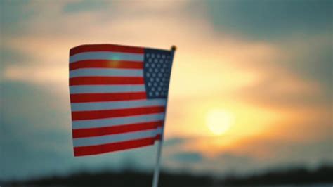 Flag Of United States Of America On Sunset Background Stock Video