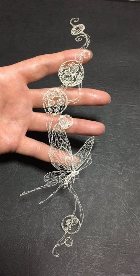 Intricate Paper Cutting Art Mimics The Precision Of A Drawing