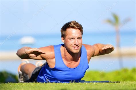 Fitness Man Training Back Extension Exercise — Stock Photo © Maridav