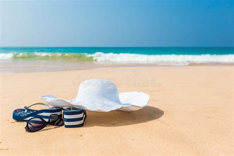 Hat Sun Glasses And Flip Flops Over The Sand Stock Photo Image Of