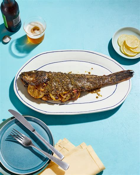 Grilled Whole Stuffed Fish With Sun Dried Tomatoes Feta And Herb