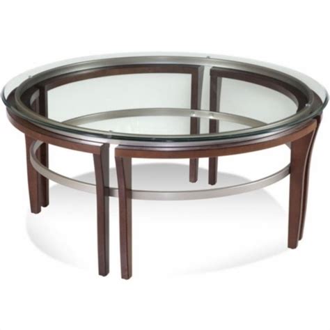 The coffee table creates a common focal point in any living room and is essential in serving and entertaining guests. Bassett Mirror Fusion Round Glass Top Cocktail Table in ...