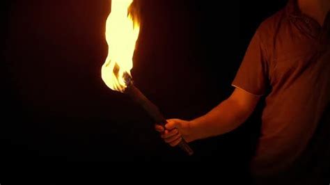 Man Lights Torch On Fire And Explores Stock Footage Videohive