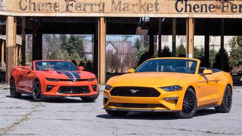 We drive both for a week, to see which drop. Chevy Camaro SS Vs. Ford Mustang GT: Top-Down Tussle