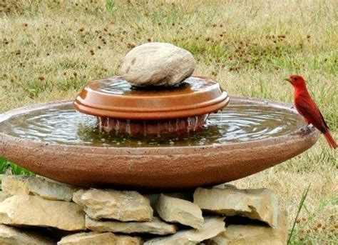 If the birds visit your garden or balcony often, you can also try use it to create this spectacular water fountain+bird bath with the help of this diy post. DIY Fountain Ideas - 10 Creative Projects - Bob Vila