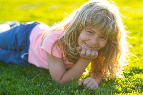Summer Child Face Smiling Child Boy With Grass Background Happy