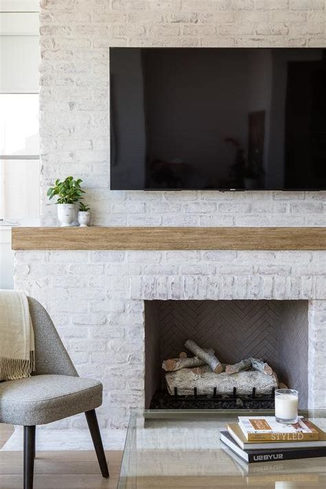 White Brick Fireplace With Rustic Wood Mantel Fireplace Ideas