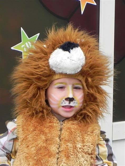 In today's video i'm showing. Simple lion face paint for kids. I later added a black ...