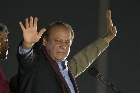 pakistan s self exiled former prime minister nawaz sharif returns home ahead of a parliamentary vote