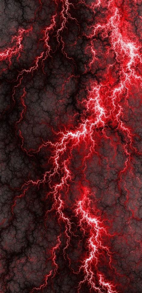 Red And White Lightning Streaks In The Night Sky Over Black Ground With