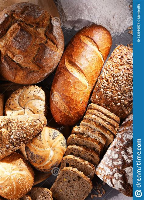 Assorted Bakery Products Including Loafs Of Bread And Rolls Stock Photo