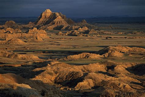 A Landscape Of Isolated Buttes And Rock Photograph By Annie Griffiths