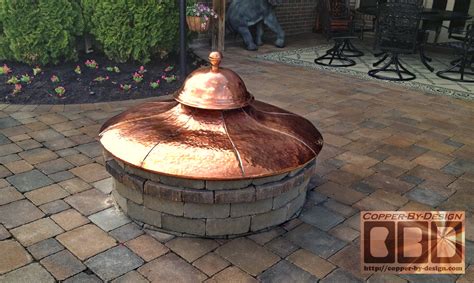 The pits are designed with metallic structures with woven wicker applied as masks to cover up the metal fire pit styled outdoor log burner platform. CBD's Van Der Merwe Vented Fire Pit Cover Page