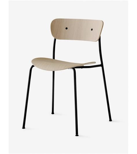The pavilion chair is inspired by the designs originally created for the international exhibition and it's barcelona style chair replica. Pavilion &Tradition Chair - Milia Shop