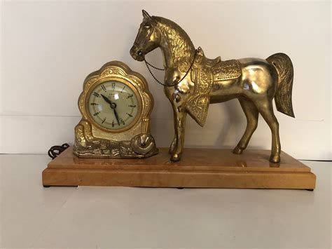 Vintage United Self Starting Gold Tone Horse And Clock On Bakelite Base