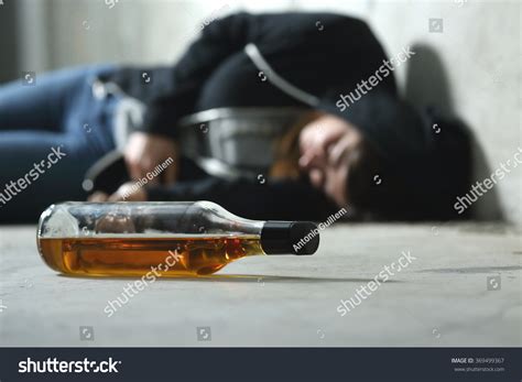 Sad Person With A Glass Of Alcohol Over 11059 Royalty Free Licensable