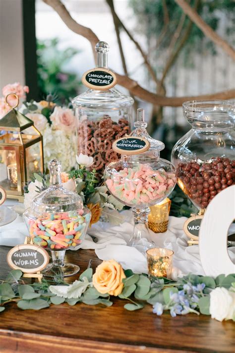 Candy Display On A Wooden Table Wedding Candy Display Garden Wedding
