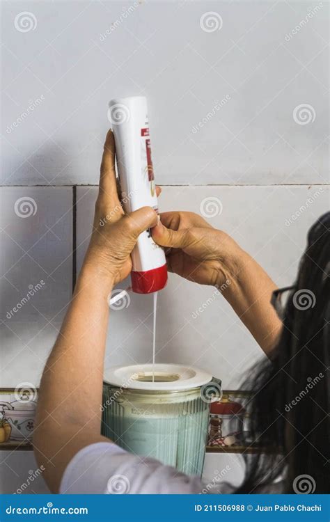 Woman Pouring Shampoo In A Glass Blender Stock Photo Image Of Hand