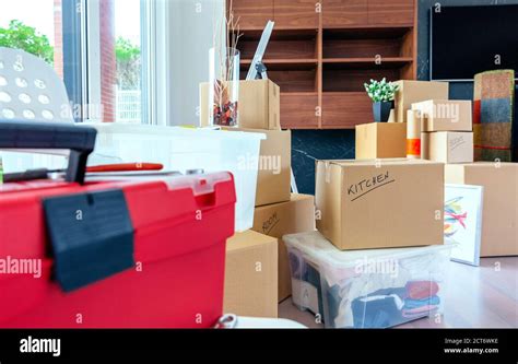 Living Room With Moving Boxes Stock Photo Alamy