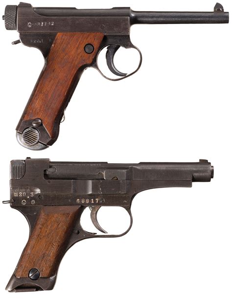 Two Late Wwii Japanese Military Pistols With Holsters Rock Island Auction