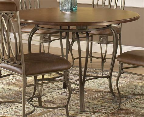 Elegant greek key design featured on the gold leaf metal base with beveled edge glass insert top, adorn this very reminiscent art noueau, art deco period look. Wrought Iron Kitchen Table Ideas - HomesFeed