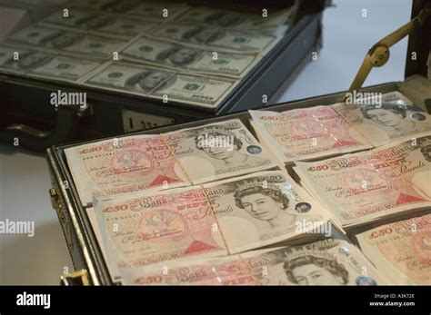 Briefcase Money Pound Hi Res Stock Photography And Images Alamy