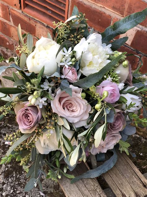 Hand tied posy wedding bouquets. Hand tied bouquet of amnesia roses, quicksand roses ...