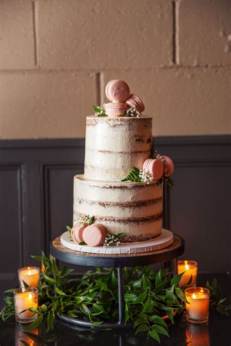 Two Tier Naked Cake With Pink Macarons Naked Wedding Cakes Wedding