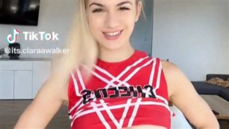 Cheerleader Clara Walker Shows Off Underboob In Her Uniform And Goes