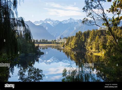 Mount Tasman And Aoraki Mount Cook Reflected In Lake Matheson