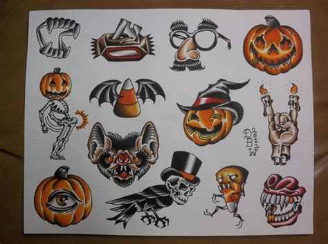 An Assortment Of Halloween Tattoos On A Piece Of White Paper With Orange And Black Ink