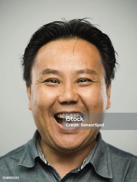 Real Chinese Mature Man With Very Excited Laughing Looking At Camera