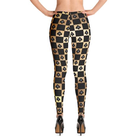 queen of spades leggings gold and black checkerboard design with queen of spades motif ideal
