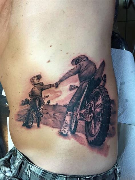 Honestly, no father son tattoos in this world can truly describe the beautiful bonding that the two. Motor cycle tattoo of father and son. it | Tattoo for son ...