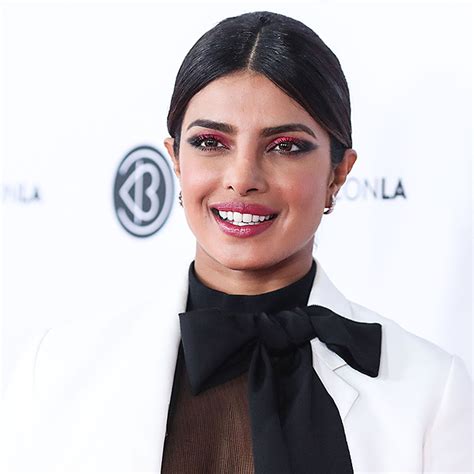 priyanka chopra just flaunted her incredibly toned legs in a high slit sequin dress—we re