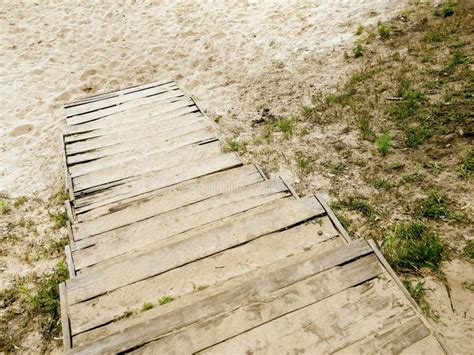 Wooden Steps Descent To The Beach By Wooden Stairs Wooden Stairs To