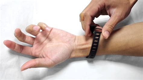 How To Wear The Wrist Band For Fitbit One Youtube