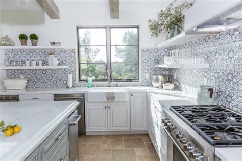 If you're looking for a classic, clean look in a high volume home kitchen, you should definitely consider the professional grade backsplash made of stainless steel. Kitchen Backsplash Tile: How High to Go? | Driven by Decor