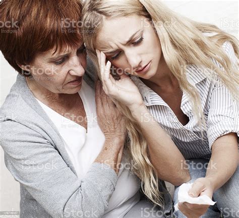 Mother Soothes Crying Daughter Stock Photo Download Image Now Adult
