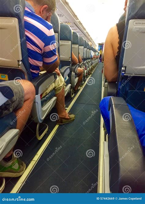 Interior Of Airplane With Passengers On Board Editorial Stock Image