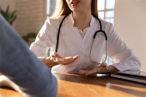 Caucasian Female Doctor Consult Patient At Meeting Stock Photo Image