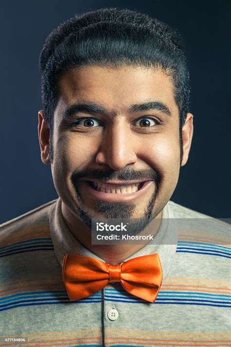 Serious Man With Orange Bow Tie And Frown Face Stock Photo Download