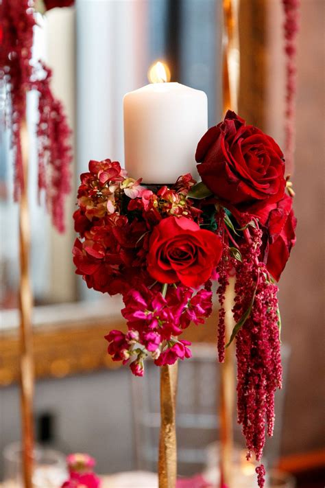 Bold Candle Accent With Red Roses