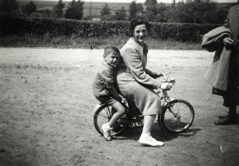 Michel Rides On A Bicycle Behind His Aunt Paulina Trocki When She Came