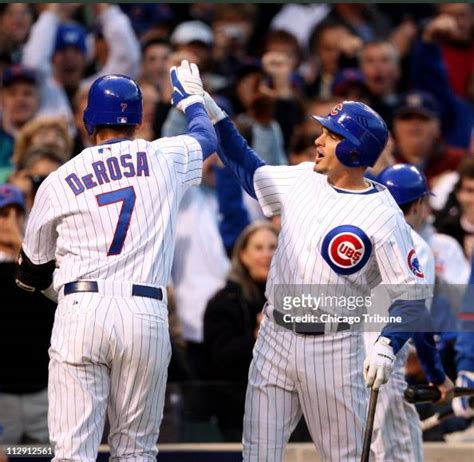 The Chicago Cubs Mark Derosa Is Congratulated By Teammate Ryan News