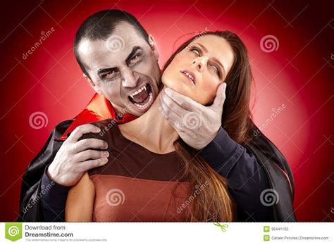Vampire Preparing To Bite His Victim Stock Photo - Image of fangs