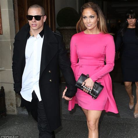 chic jennifer in a flirty hot pink minidress by valentino as she stepped out to the designer s