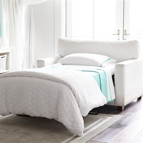 This sleeper chair is perfect for your living room, den, or dorm room where an unexpected guest or unexpected nap may surprise you. Chair and A-Half Sleeper (54") | Pottery Barn Teen