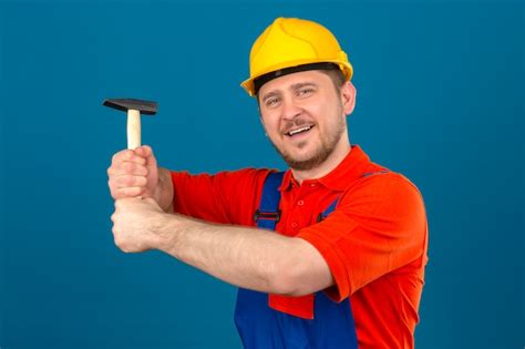 Builder Homme Portant Des Uniformes De Construction Et Un Casque De