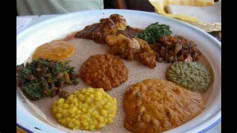 The ethiopian kikil is a mild stew with potatoes and lamb that is slowly cooked to get all the flavors from the bones. Most Common Ethiopian Foods - YouTube